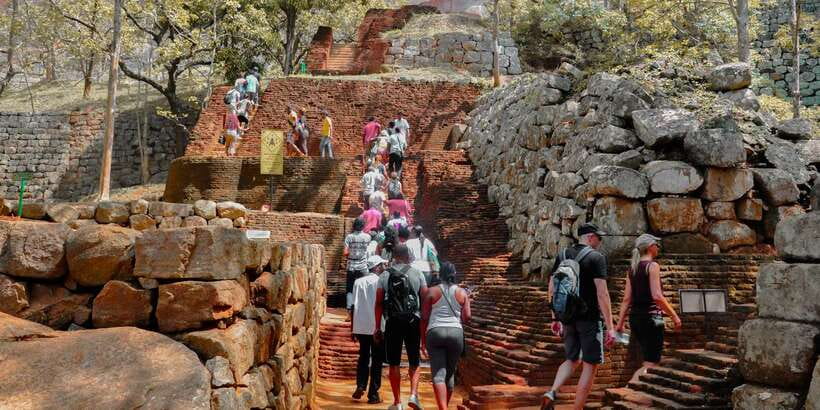 From Colombo: Sigiriya and Dambulla Full-Day Private Tour - Climbing Sigiriya Lion Rock