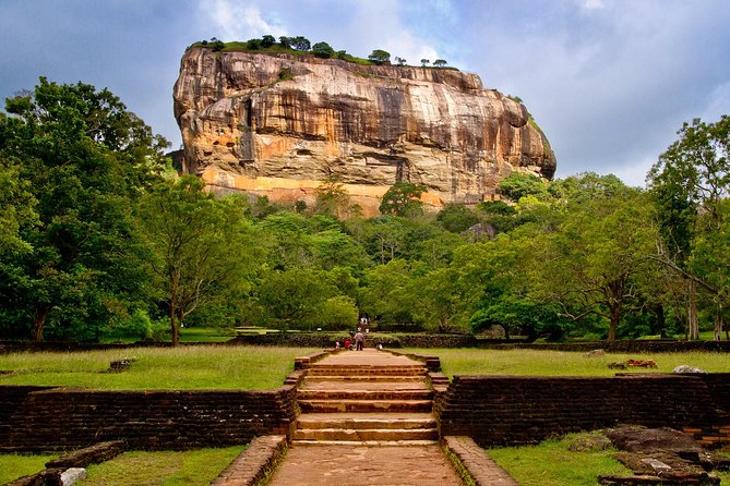 Sigiriya city tour from Negombo & Colombo with traditional Lunch. - Climbing Sigiriya Lion Rock